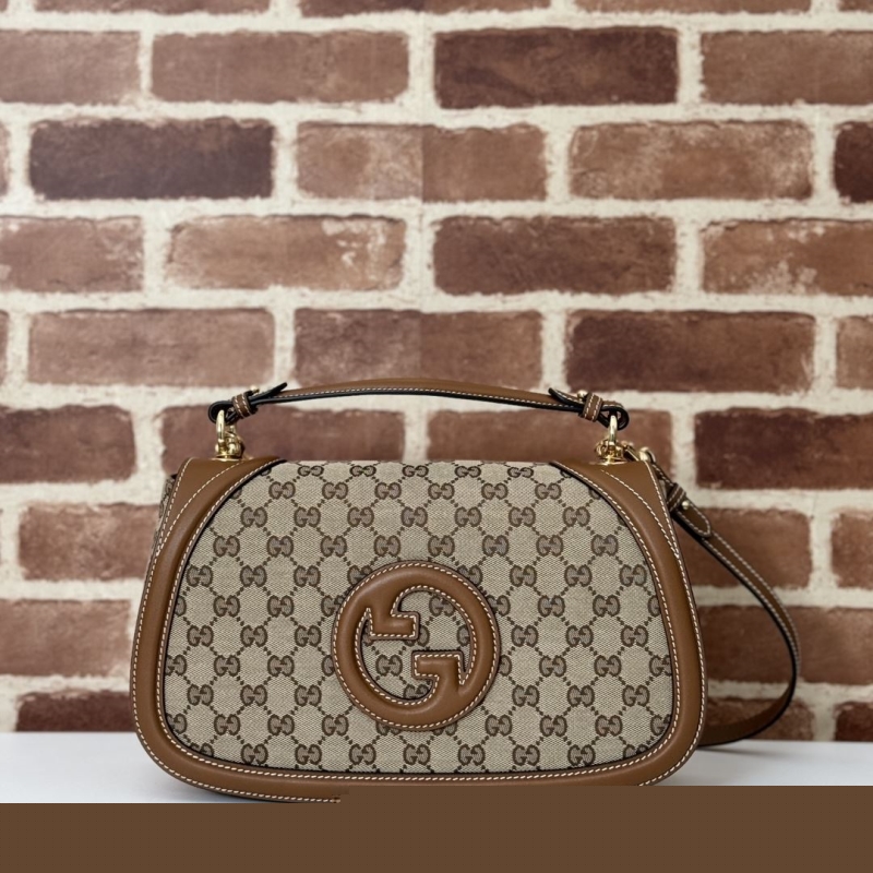 G*u*i satchel bags